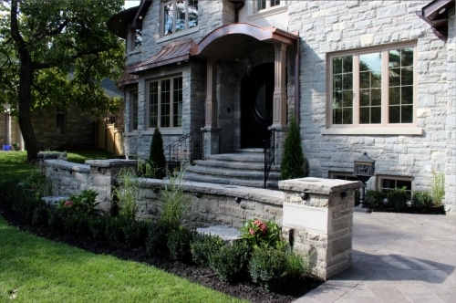 Front yard landscaping, retaining wall, rock garden, interlocking driveway, shrubs, hedge, steps, professional services