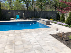 Retaining Wall, backyard landscaping, paver, types of patios, pool, waterfall